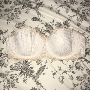 Strapless white lace bra